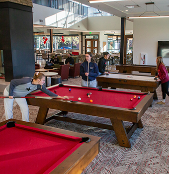 Students playing pool