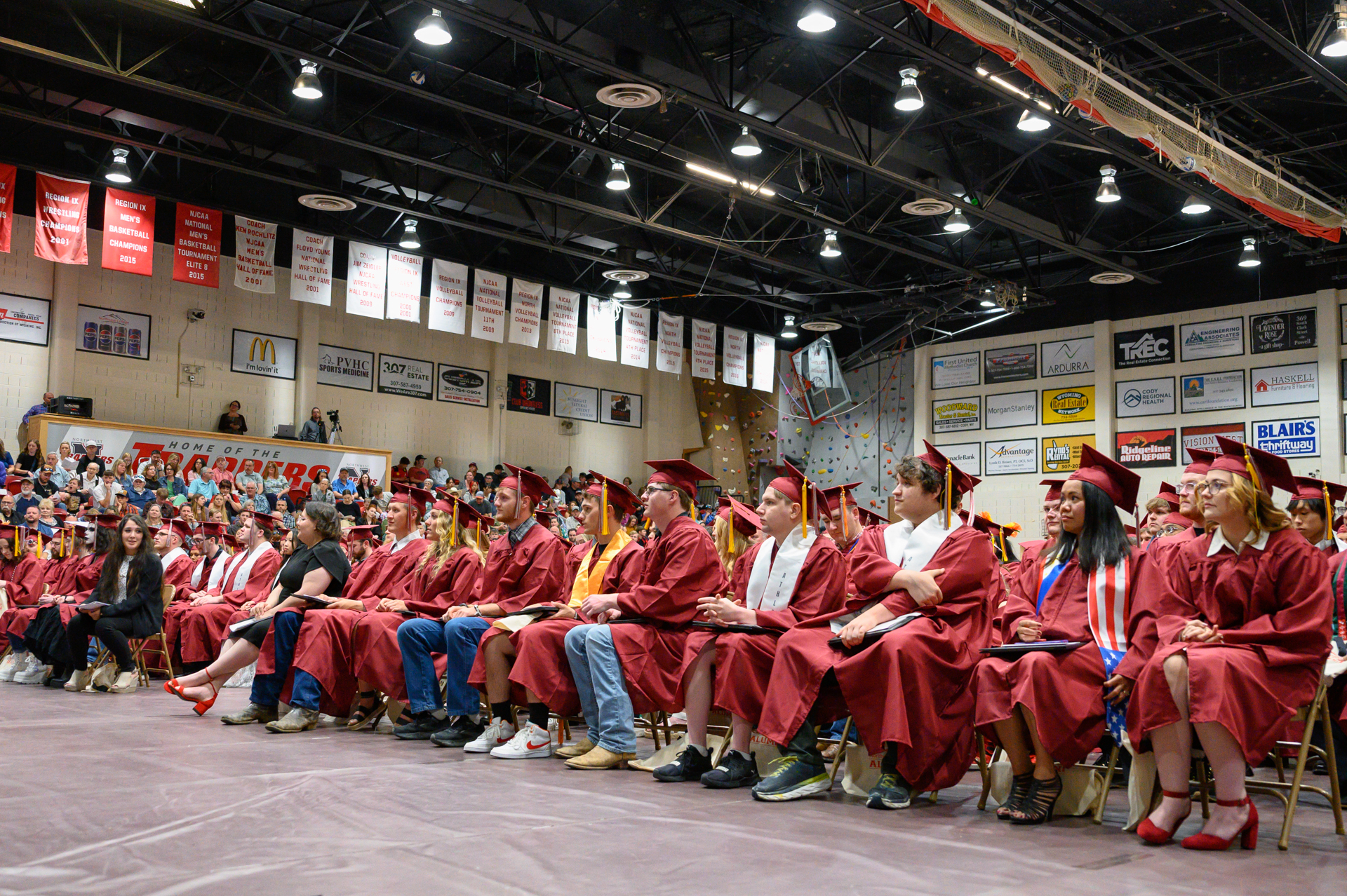 Front row of graduates at a Northwest College commencement ceremony